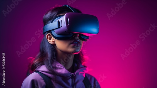 Girl in VR glasses on a purple background. © kept