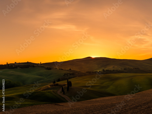 the beautiful sunrise over the tuscany landscape in italy
