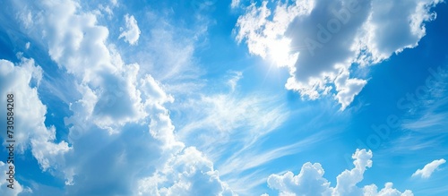 Bright summer sky with white clouds.