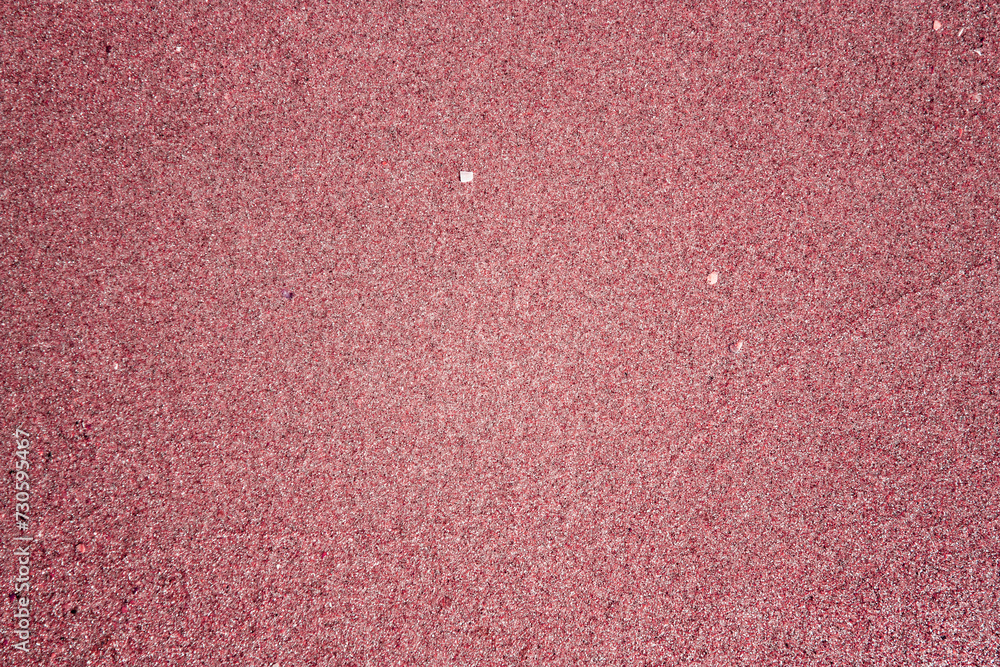 Abstract view with sea sand texture. Sand deposits in different color abstraction. The structure of grains of silicate sand is specially tinted in different colors. Abstract view with sea sand texture. Sand deposits in different color abstraction. The structure of grains of silicate sand is specially tinted in different colors.