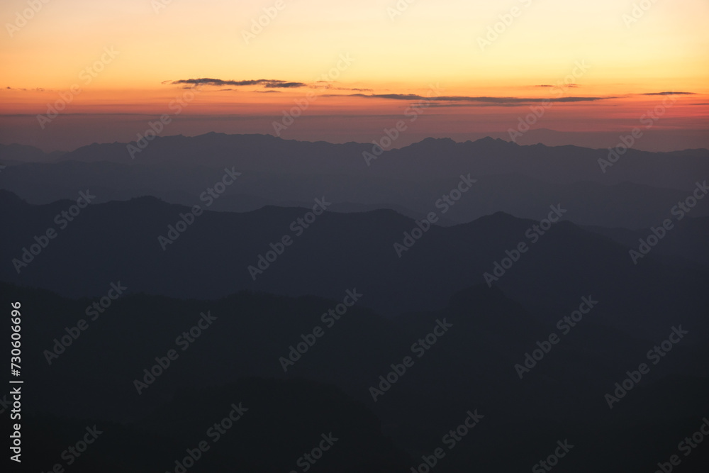 Landscape image of mountains view and colorful sky before sunset