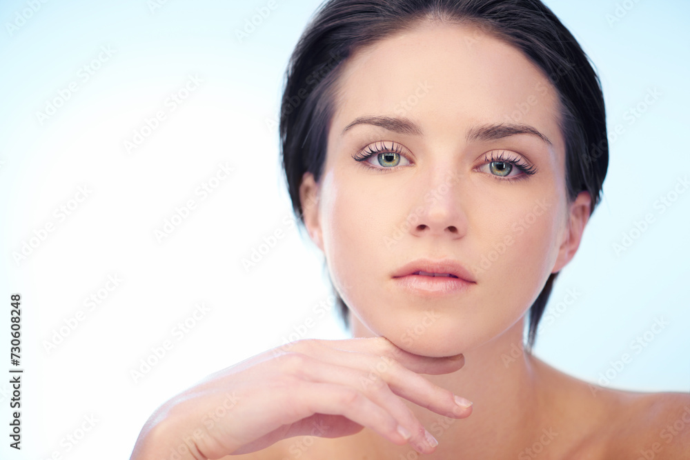 Skincare, model or portrait of woman in studio isolated on blue background for wellness or anti aging. Smooth, spa or natural dermatology results of lady or confident person with beauty, face or glow