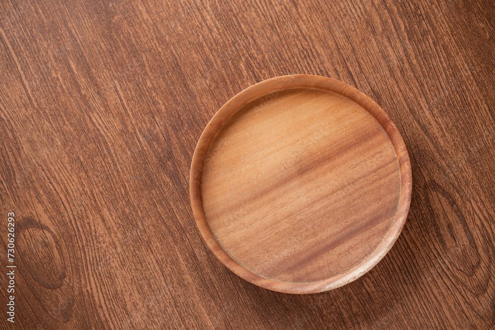 Wooden Plate mockup, empty modern minimal table place setting wooden texture top view. Space for text or menu. Business food brand template. Wooden Plate mockup, empty modern minimal table place setting wooden texture top view. Space for text or menu. Business food brand template.