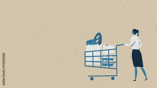 A woman pushing a shopping cart. 