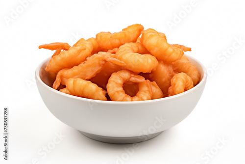 tempura prawns or shrimps fried in breadcrumbs in bowl with sesame seeds, isolated on white background photo