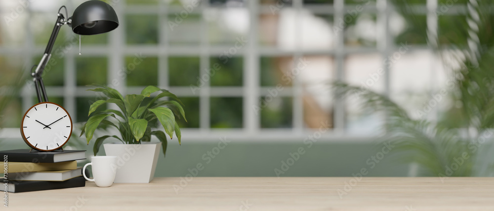 An office desk featuring a designated space against a blurred background of a modern office corridor An office desk featuring a designated space against a blurred background of a modern office corridor