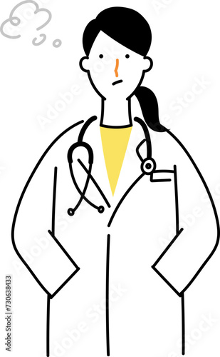 考え事をする女性医師