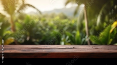 Blank wooden table and tropical de focus background. Mock up template for product presentation. copy space.