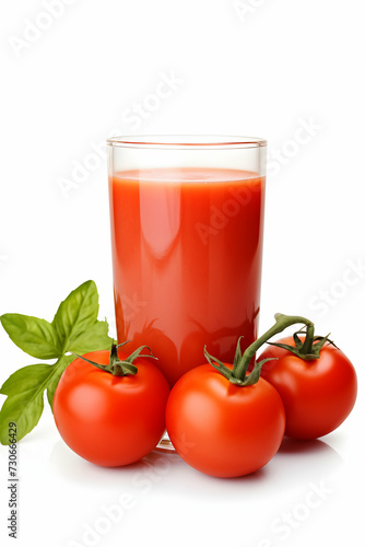 Glass of tomato juice and tomatoes and red chilli papper isolated on white background
