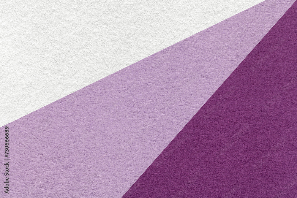 Fototapeta premium Texture of old craft white, purple and lilac color paper background, macro. Vintage abstract violet cardboard