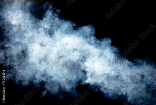 Blue smoke isolated black background