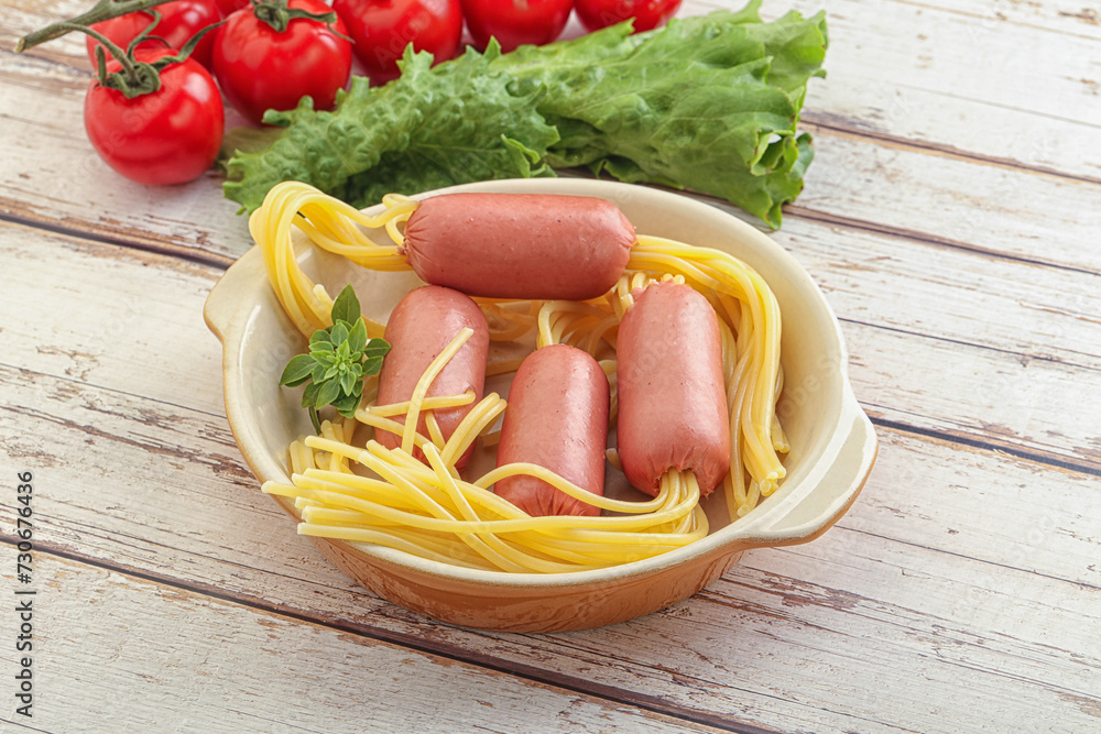Mini sausages with pasta spaghetti Mini sausages with pasta spaghetti