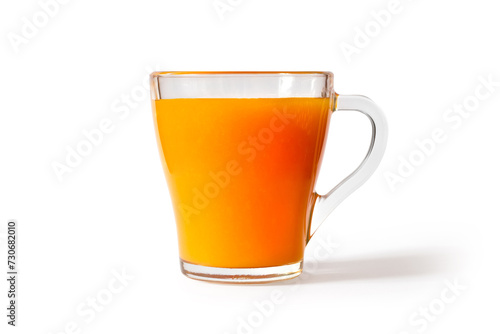 Cup of natural fruit juice on white background. Glass cup with orange juice. With a shadow.