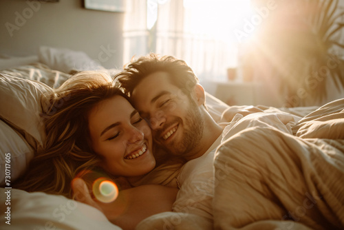 a couple that wakes up in bed in the morning and is happy