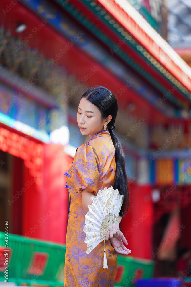 Chinese woman in traditional costume for Happy chinese new year concept
