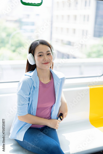 Free Download Photo of young Asian woman on metro - GFXLoad