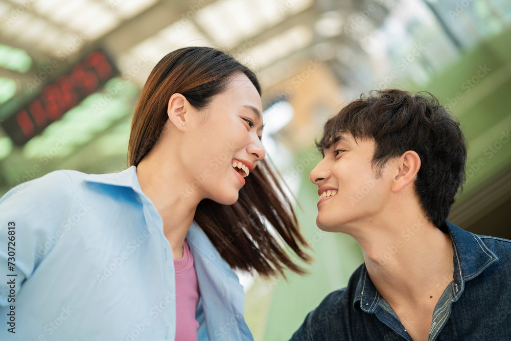 Photo of young Asian couple hang out together Photo of young Asian couple hang out together