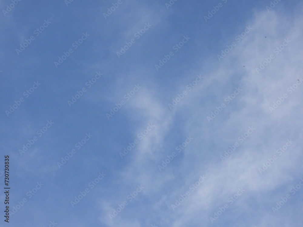 blue sky with soft clouds