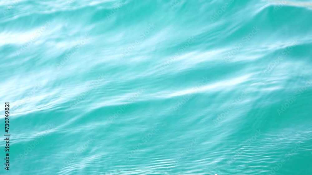 Sea water surface. Camera flies over the calm azure sea. Nobody. Holiday recreation concept. Abstract nautical summer ocean nature. Weather and climate change. Slow motion. Close up Sea water surface. Camera flies over the calm azure sea. Nobody. Holiday recreation concept. Abstract nautical summer ocean nature. Weather and climate change. Slow motion. Close up