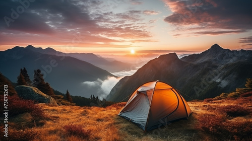 Camping tent high in the mountains. tourist tent camping in mountains at sunset
