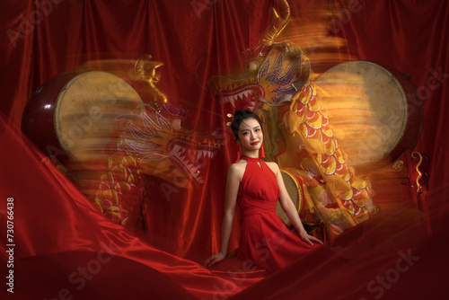 Dragon Year and New Year atmosphere, celebrated by an Asian young woman photo