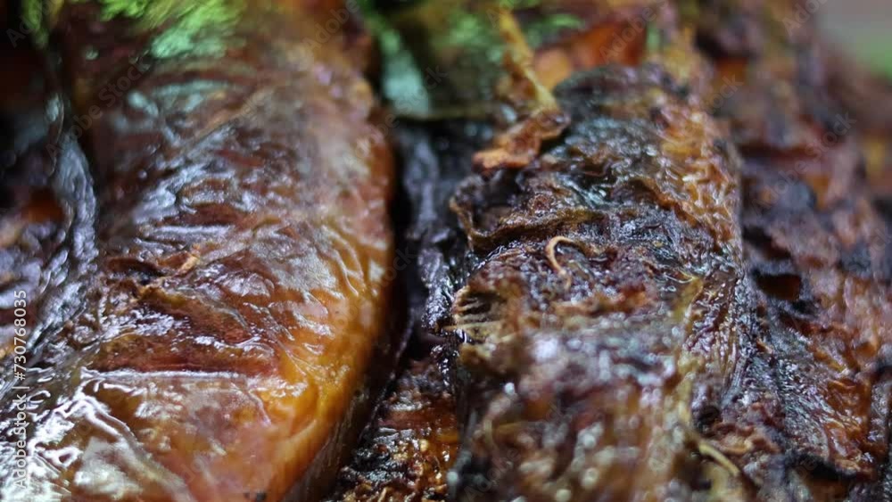 Close-Up of Grilled Fish Cooking Close-Up of Grilled Fish Cooking
