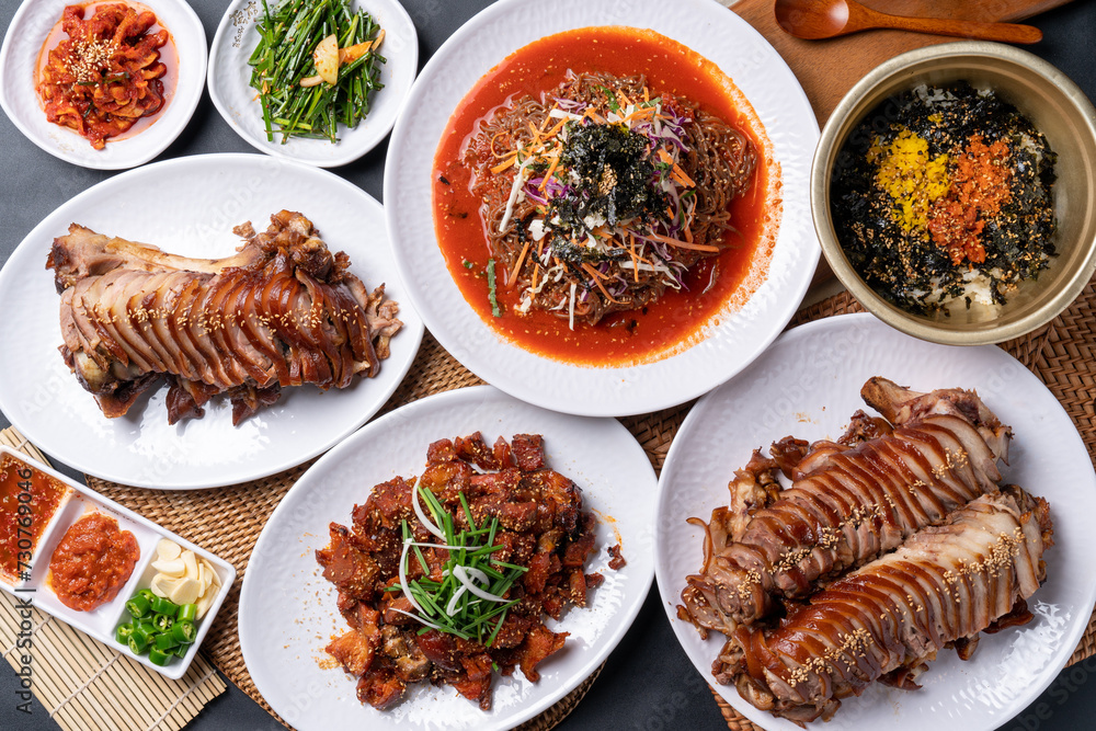 Jokbal, Korean food, steamed pork, tray, buckwheat noodles, side dishes, salted shrimp, lettuce, spicy, oriental medicine, flying fish roe, rice balls,