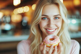 Photo of attractive woman happy with donut