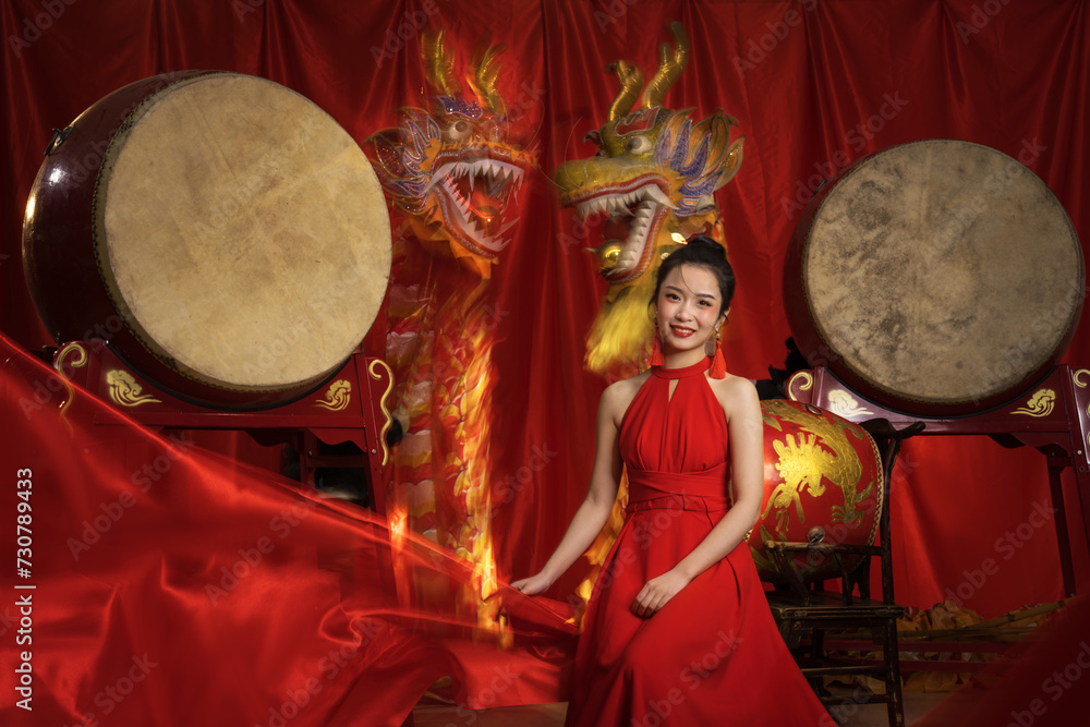 Dragon Year and New Year atmosphere, celebrated by an Asian young woman Dragon Year and New Year atmosphere, celebrated by an Asian young woman