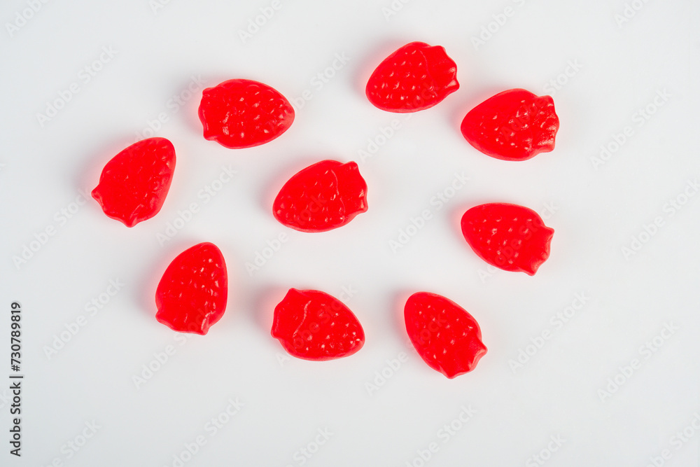 Fototapeta premium Fruit gummi candies assortment on white background 