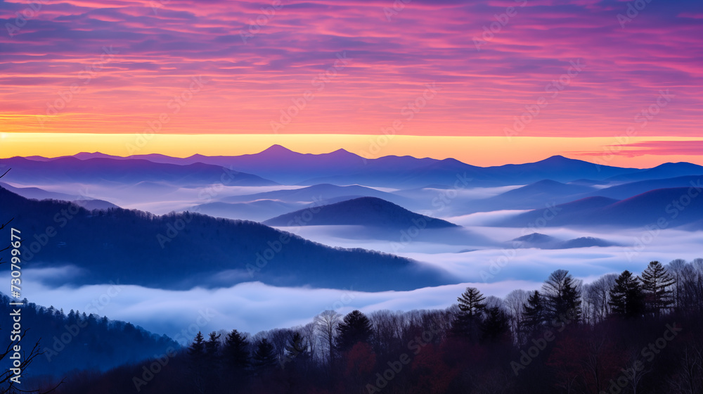 A frosty January sunrise over a mountain range, with hues of pink and orange in the sky