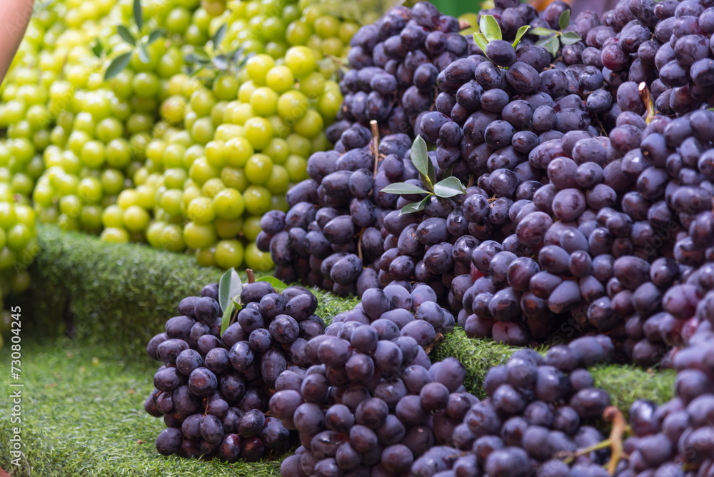 Closeup focus to fresh grape in front store