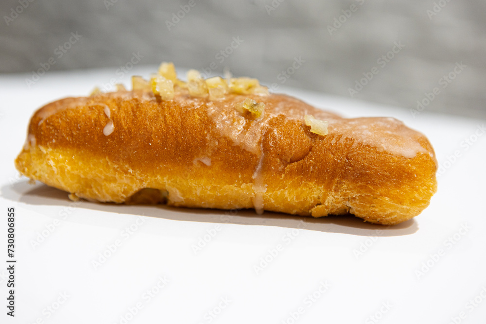 donut with fruit inside and sprinkles, bread, close-up view, on a light background, blurred background
donut with fruit inside and sprinkles, bread, close-up view, on a light background, blurred background