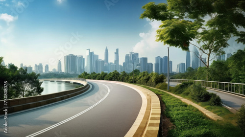 View of Empty road highway with lake garden and modern city skyline in background.