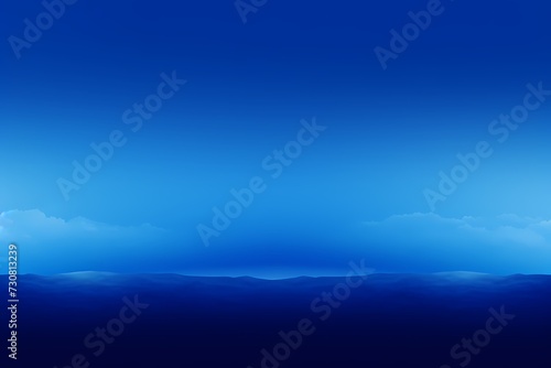 Strikingly beautiful empty solid color background with a deep royal blue reminiscent of the evening sky