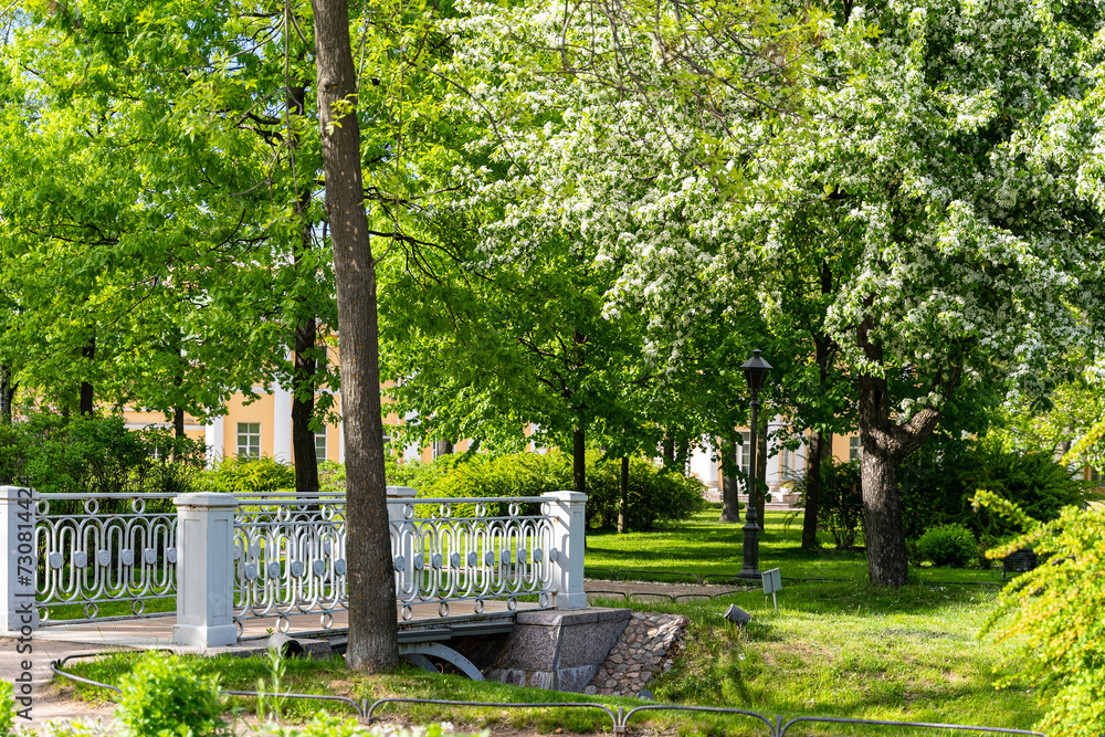 Polish garden at the Derzhavin estate. Gorgeous spring bloom. Pond, bridge Polish garden at the Derzhavin estate. Gorgeous spring bloom. Pond, bridge