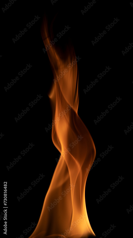 Long flames of fire on a black background