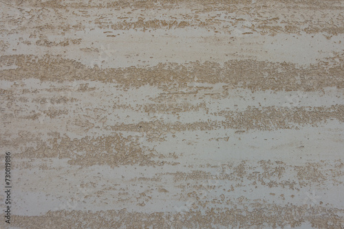 Backdrop - beige semi-smooth wall with stucco lace finish