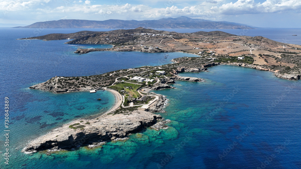Aerial drone photo of paradise secluded beach and bay of Agios Vasileios located in long peninsula of small island of Schoinousa, Small Cyclades, Greece