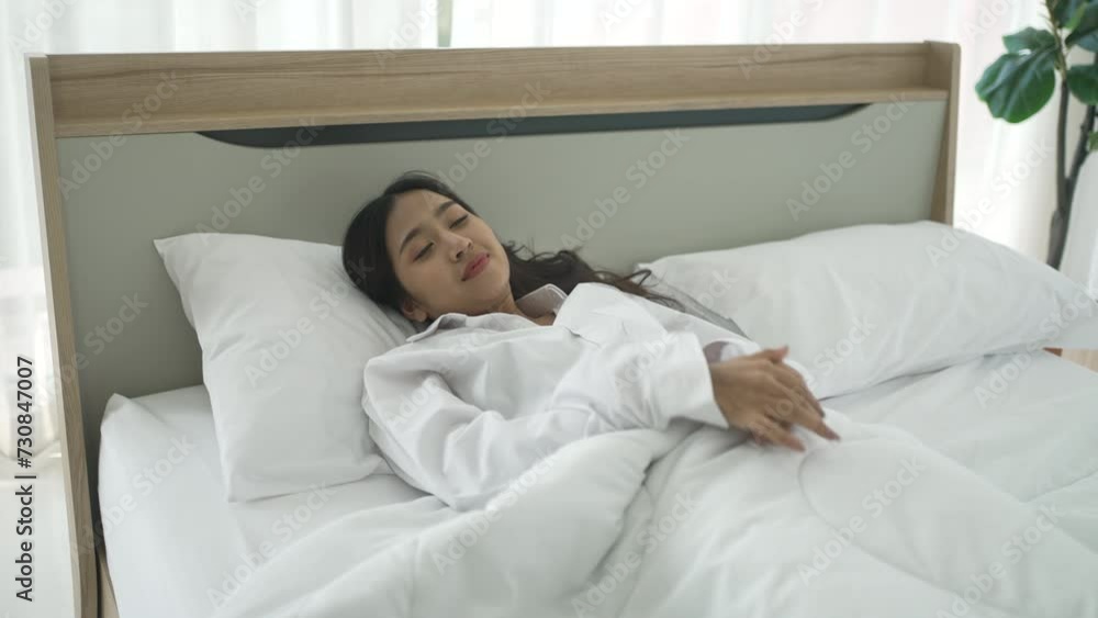 Young woman wake up and work at bedroom. Young woman wake up and work at bedroom.