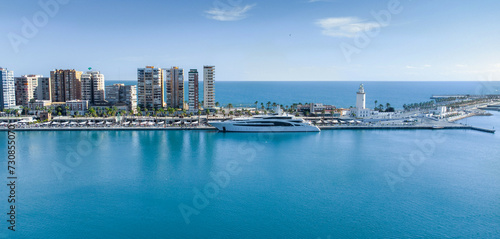 Spain yacht glides into the bustling port of Malaga, Spain, its presence exuding an aura of luxury and affluence. This captivating footage captures the yacht's grandeur