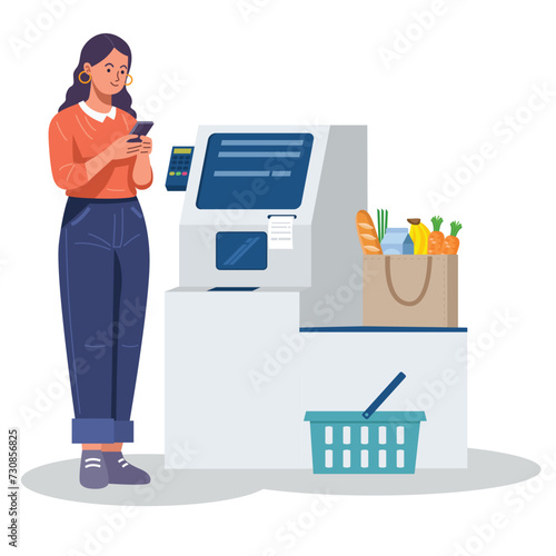 A woman pays for her grocery at a self-service checkout kiosk