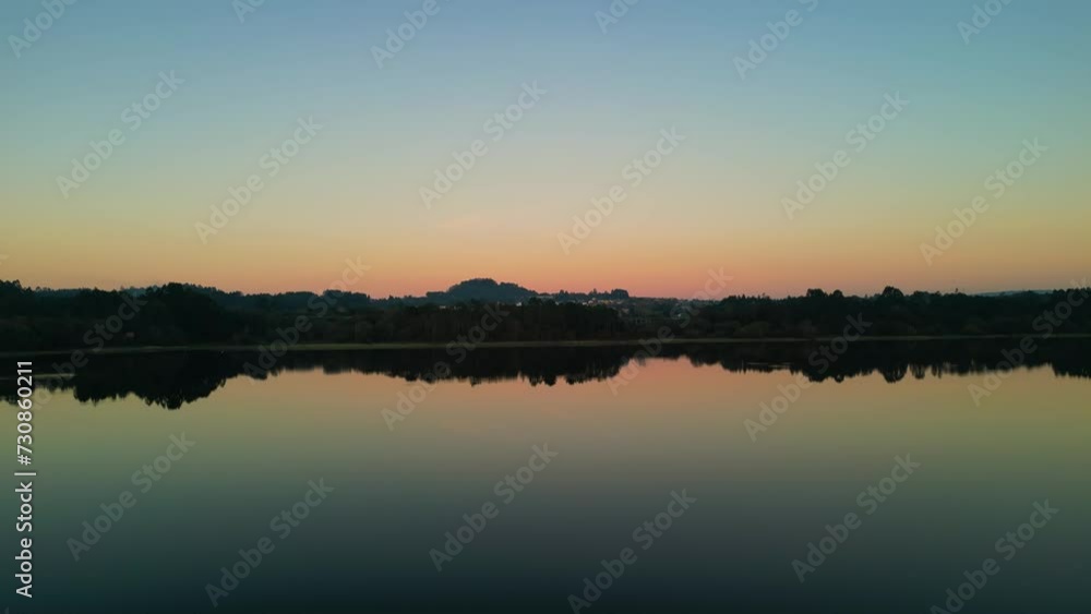 Drone shot of the tranquil water of Cecebre reservoir lake (Encoro de Cecebre) at sunset, Spain Drone shot of the tranquil water of Cecebre reservoir lake (Encoro de Cecebre) at sunset, Spain