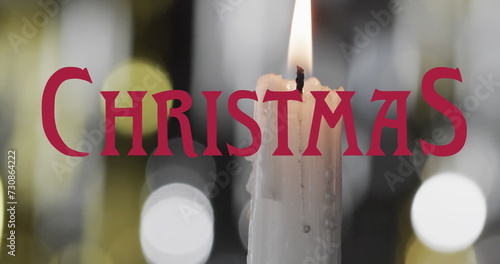 Image of christmas text over lit candles background