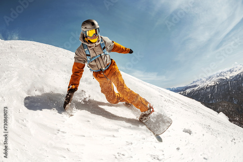Cuadro en lienzo Fast happy professional snowboarder rides at off-piste ski slope