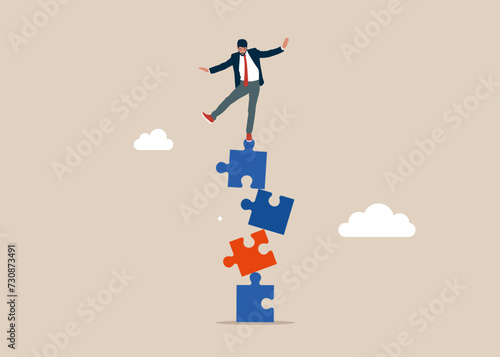 Businessman falling from stack of unstable puzzle. Modern vector illustration in flat style