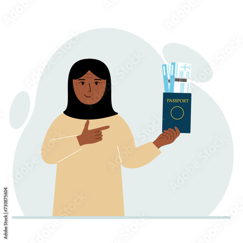 A woman holds a passport with air tickets. The woman shows the boarding pass. Travel concept.