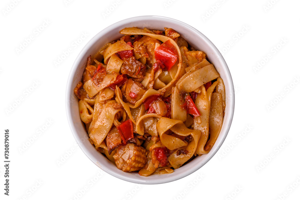 Delicious asian udon dish with vegetables, mushrooms, salt and spices Delicious asian udon dish with vegetables, mushrooms, salt and spices