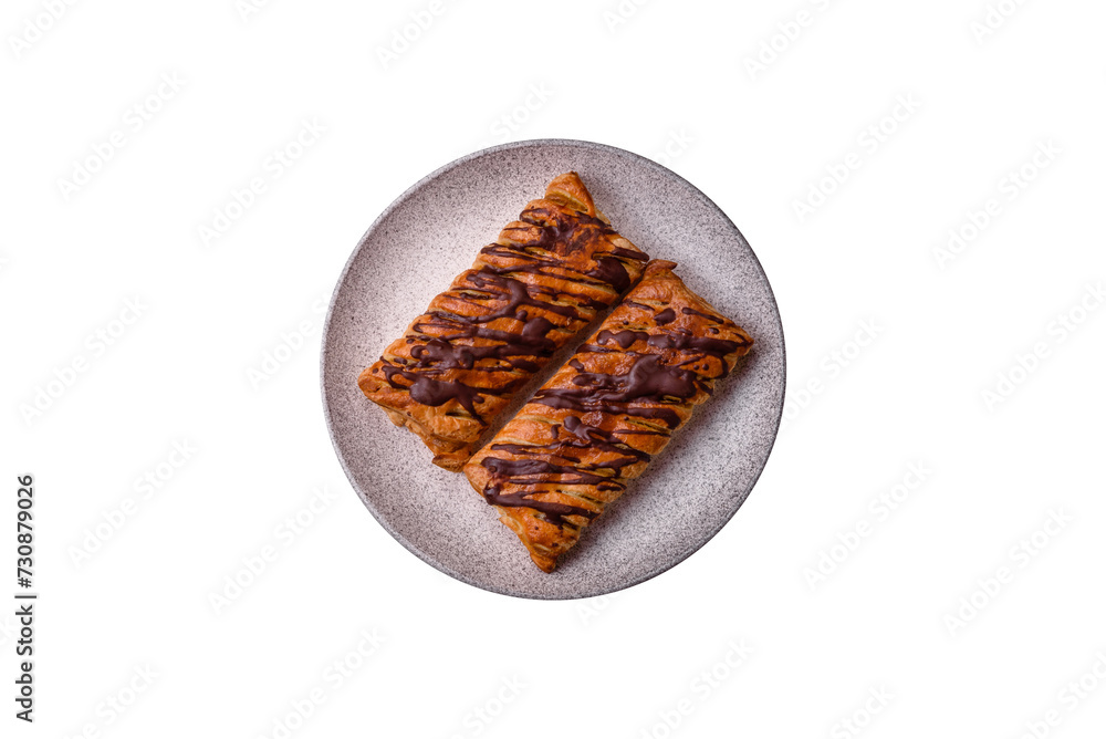 Delicious crispy sweet puff pastry with chocolate and salted caramel Delicious crispy sweet puff pastry with chocolate and salted caramel