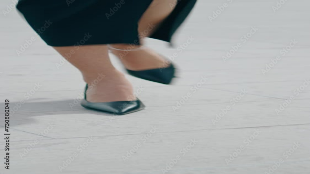 Woman legs walking road close up. Unknown girl in heels stepping street vertical Woman legs walking road close up. Unknown girl in heels stepping street vertical